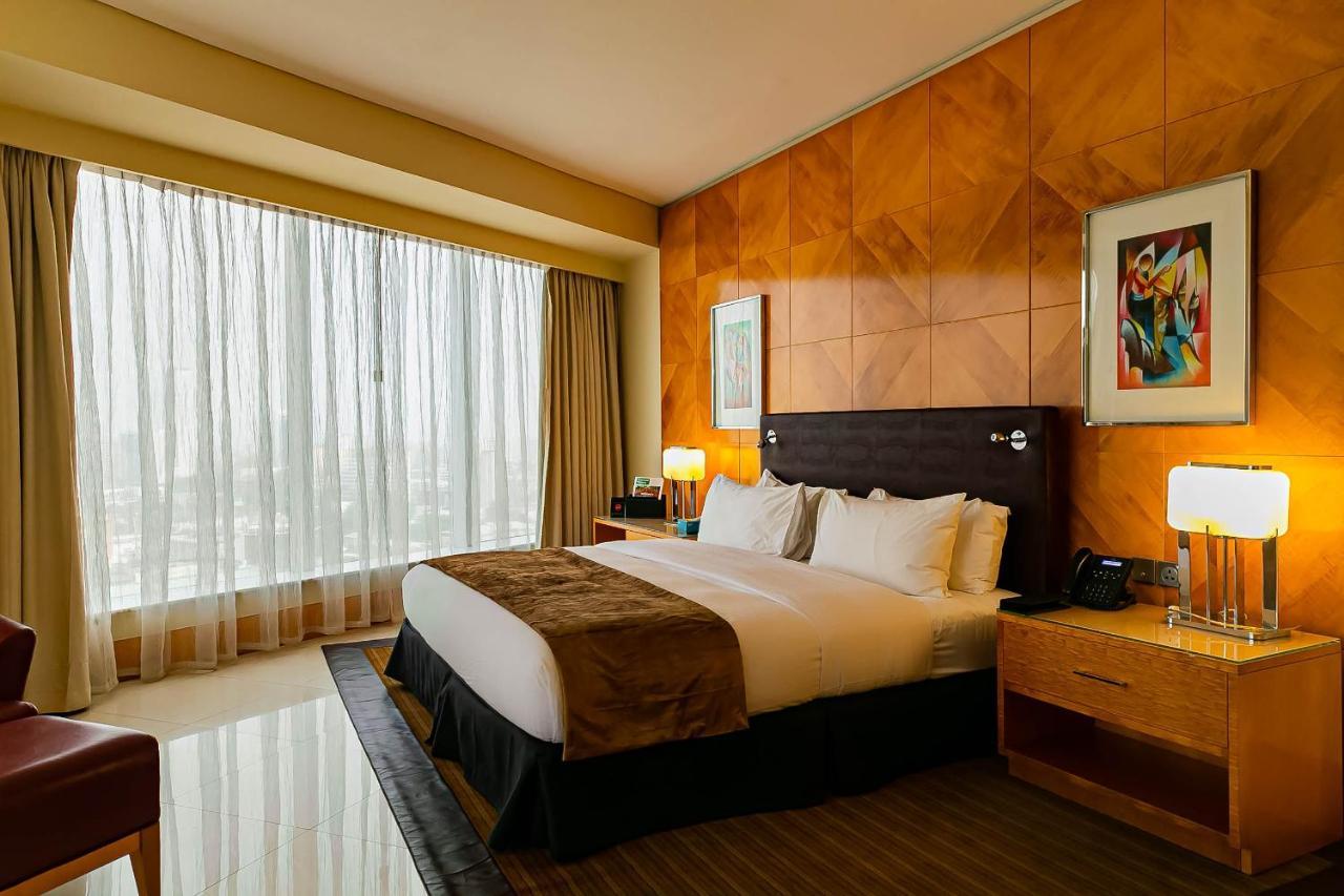 Lagos Continental Hotel Εξωτερικό φωτογραφία A bedroom at the Ritz-Carlton, Dubai